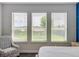 A great view from the bedroom's three large windows at 224 Silver Maple Rd, Groveland, FL 34736