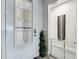 Elegant foyer with a decorative glass door and a stylish interior at 224 Silver Maple Rd, Groveland, FL 34736