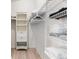 Walk-in closet with shelving and ample storage, perfect for organization at 2457 Upton St, The Villages, FL 32163