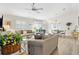 Cozy living room with an open layout, hardwood floors, and comfortable seating at 2457 Upton St, The Villages, FL 32163