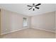 This is a simple bedroom with a fan and window at 2744 Gresham Ave, The Villages, FL 32162