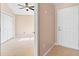 Entryway with coat hooks and closet leading to the bedroom at 2744 Gresham Ave, The Villages, FL 32162