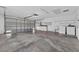 Spacious garage with washer, dryer, utility sink and storage at 2744 Gresham Ave, The Villages, FL 32162
