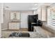 Kitchen featuring granite countertops, stainless steel appliances and plenty of cabinets at 2744 Gresham Ave, The Villages, FL 32162