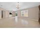 Spacious living room featuring tile floors, neutral paint colors and plenty of natural light at 2744 Gresham Ave, The Villages, FL 32162
