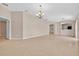 Spacious living room with tile flooring, recessed lighting, and open layout to the kitchen at 2744 Gresham Ave, The Villages, FL 32162