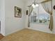 Dining area with large windows offering plenty of natural light at 3001 Lake Huron Ln, Tavares, FL 32778