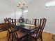 Dining room features a chandelier and classic dining set for entertaining at 3001 Lake Huron Ln, Tavares, FL 32778