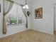Bright dining space with a window view, ready for Gathering meals at 3001 Lake Huron Ln, Tavares, FL 32778