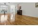 Bright living room with wood floors, fireplace, and lots of light at 3001 Lake Huron Ln, Tavares, FL 32778