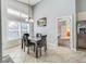 Bright dining room featuring a vaulted ceiling at 310 Ballyshannon Dr, Davenport, FL 33897