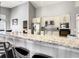 Modern kitchen with stainless steel appliances and granite countertop at 310 Ballyshannon Dr, Davenport, FL 33897