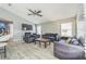 Open living room with ceiling fan and recessed lighting at 310 Ballyshannon Dr, Davenport, FL 33897