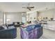 Spacious open-concept living room leading to the kitchen and dining areas at 310 Ballyshannon Dr, Davenport, FL 33897
