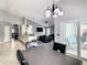 Open floor plan with kitchen, dining, and living room at 310 Ballyshannon Dr, Davenport, FL 33897