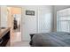 Bedroom with view to hallway, closet and window providing natural light at 3138 Aurea Pl, The Villages, FL 32163