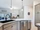 Modern kitchen featuring granite countertops, stainless steel appliances, and a spacious island at 3138 Aurea Pl, The Villages, FL 32163