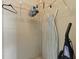 A well-organized walk-in closet with ample hanging space and storage shelves at 32521 W Golf Ct, Leesburg, FL 34748