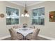 Cozy breakfast nook with views of the green landscape at 3677 Arlington Ridge Blvd, Leesburg, FL 34748