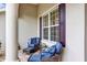 Cozy front porch with comfortable seating and stylish outdoor decor, offering a relaxing space at 3677 Arlington Ridge Blvd, Leesburg, FL 34748