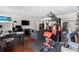 Large recreation room with workout equipment and home office space at 39812 French Rd, Lady Lake, FL 32159