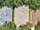 Aerial shot of homes with roofs and tree canopies at 4314 Arlington Ridge Blvd, Leesburg, FL 34748