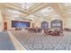 Spacious ballroom featuring high ceilings, chandeliers, and ample seating at 4314 Arlington Ridge Blvd, Leesburg, FL 34748