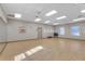 Spacious yoga studio with light wood floors, ceiling fans, and mirrored wall at 4314 Arlington Ridge Blvd, Leesburg, FL 34748