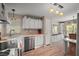 Well-lit kitchen with modern appliances and sleek design at 5300 Tigers Tail, Leesburg, FL 34748