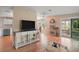 Open-concept living area with bright finishes and plenty of natural light at 5300 Tigers Tail, Leesburg, FL 34748