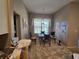 Eat-in kitchen dinette featuring tiled floors and a window with lots of light at 5300 Treasure View Way, Leesburg, FL 34748