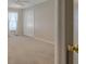 Neutral bedroom with a ceiling fan, carpeted floors, and a large closet at 5324 Treasure View Way, Leesburg, FL 34748