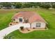Beautifully landscaped home with a well-maintained lawn and inviting curb appeal at 5400 Saddleback Ct, Lady Lake, FL 32159