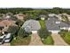 Charming single-Gathering home with well-manicured lawn, mature trees, and a two-car garage at 5604 Gulf Stream St, Tavares, FL 32778