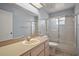 Bathroom with shower and tub combination and a large vanity at 5618 Rosewall Cir, Leesburg, FL 34748