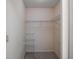 Walk-in closet with wire shelving at 5618 Rosewall Cir, Leesburg, FL 34748