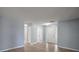 Inviting foyer with bright entry door and closet space, leading into the main living area at 5618 Rosewall Cir, Leesburg, FL 34748