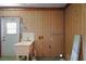 The home's laundry room features a utility sink and washer/dryer hookups at 5618 Rosewall Cir, Leesburg, FL 34748