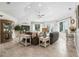 Cozy living room with ample seating, large windows, and an open layout for entertaining guests at 563 Dowling Cir, Lady Lake, FL 32159