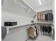 Spacious walk-in closet with ample storage space for clothes, shoes, and accessories at 563 Dowling Cir, Lady Lake, FL 32159