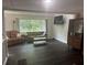 Inviting living room with hardwood floors, cozy seating, and modern decor provides a relaxing atmosphere at 606 Hamilton Dr, Orlando, FL 32833
