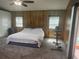 Serene bedroom with carpet, a comfortable bed, and ample closet space provides a cozy retreat at 606 Hamilton Dr, Orlando, FL 32833