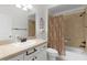 Bathroom featuring a shower/tub combo, single sink and neutral color palette at 627 Leeds Pl, The Villages, FL 32162