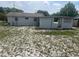 A sprawling backyard with lush lawn, offering ample space for outdoor activities and relaxation at 640 Mansfield Rd, Tavares, FL 32778