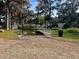 Scenic boat ramp with a serene waterfront view, perfect for boating and enjoying nature at 640 Mansfield Rd, Tavares, FL 32778
