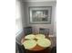 A cozy dining area featuring a round table with four chairs, perfect for intimate meals at 640 Mansfield Rd, Tavares, FL 32778