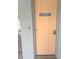 Laundry room with a salmon door and code entry for security at 640 Mansfield Rd, Tavares, FL 32778