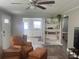 Inviting living room leading to a renovated kitchen with updated appliances at 640 Mansfield Rd, Tavares, FL 32778