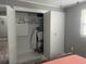 Open closet with hanging rod and wire racks for organization and accessibility at 640 Mansfield Rd, Tavares, FL 32778