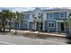 Beautiful two-story home with a blue exterior, white trim, and solar panels on the roof at 6476 Barnstorm Way, St Cloud, FL 34771